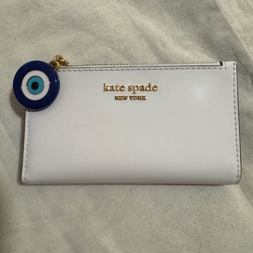 Kate Spade White Wallet with Evil Eye Charm